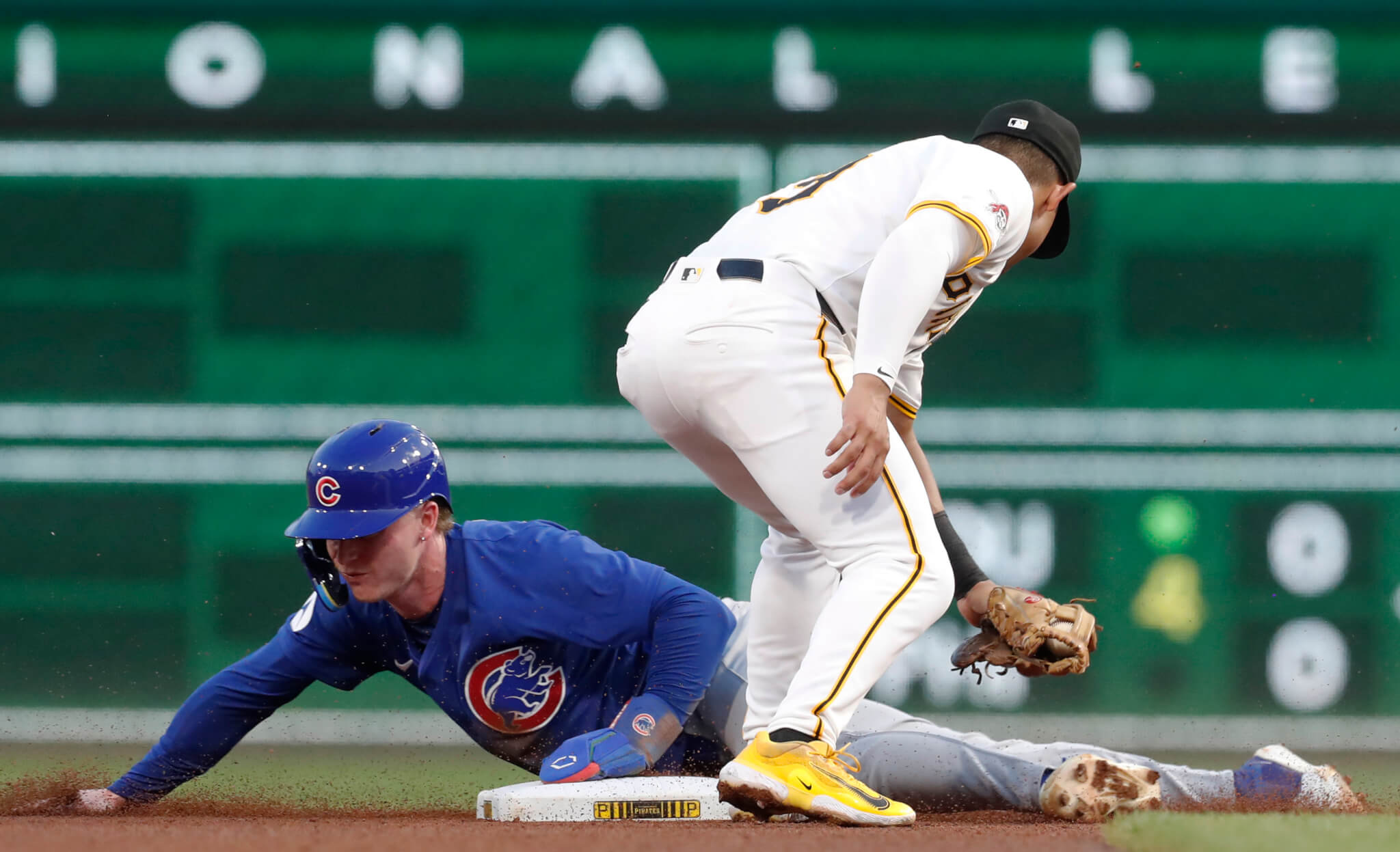 Chicago Cubs center fielder Pete Crow-Armstrong stealing second against the Pittsburgh Pirates