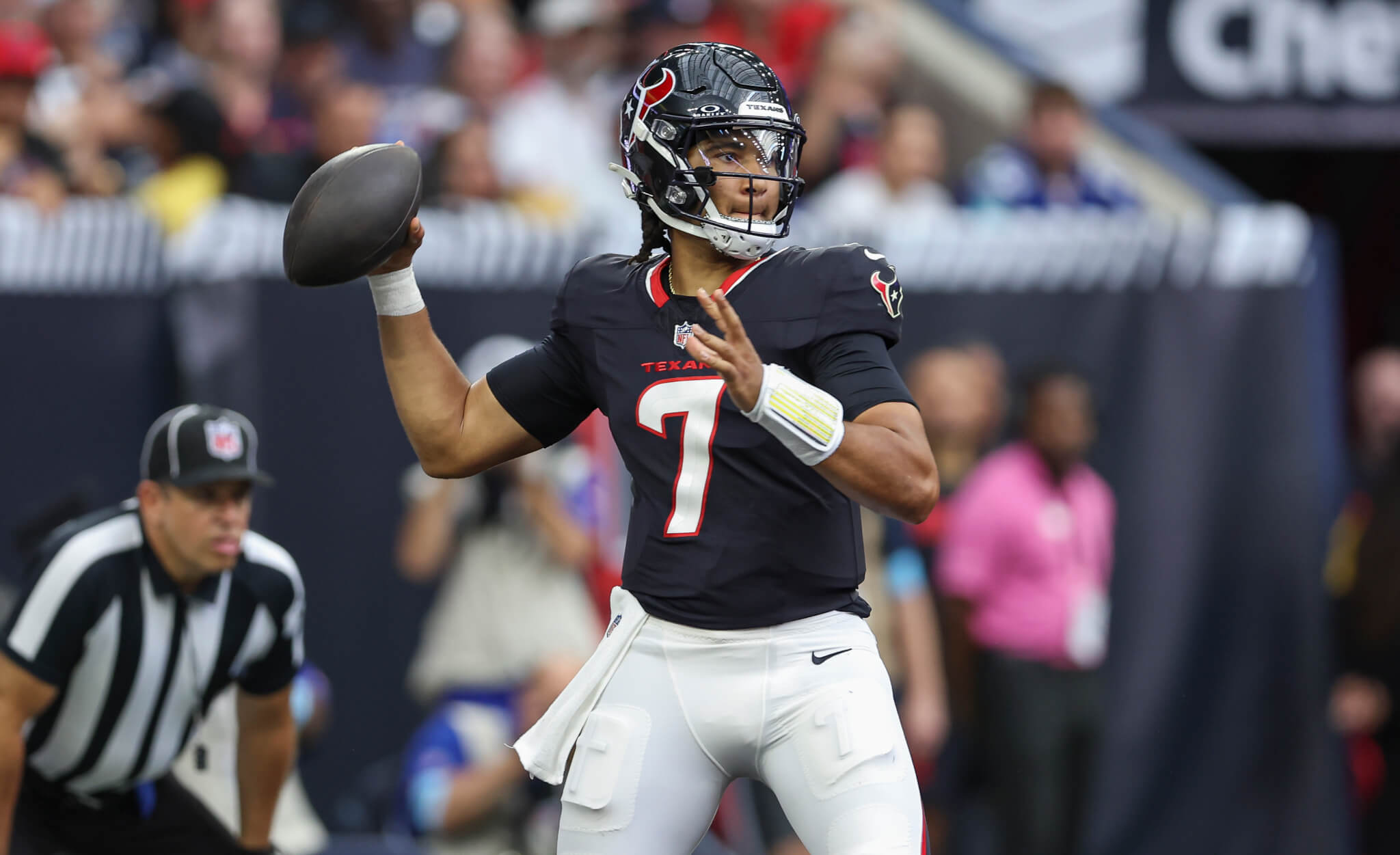 CJ Stroud throwing a football